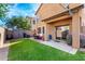 The backyard is a great outdoor space for entertaining, which features green grass at 34913 N 30Th Dr, Phoenix, AZ 85086