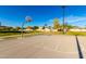 Outdoor basketball court with clear blue skies, perfect for sports and recreation at 34913 N 30Th Dr, Phoenix, AZ 85086