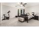 Comfortable bedroom featuring a ceiling fan, carpet and natural light from the window at 34913 N 30Th Dr, Phoenix, AZ 85086