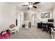 This bonus room includes a ceiling fan, desk, and play area at 34913 N 30Th Dr, Phoenix, AZ 85086