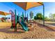 Brightly colored community playground with slides and climbing structures for to play and explore at 34913 N 30Th Dr, Phoenix, AZ 85086