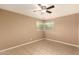 A bright room with tile floors, neutral walls, and natural lighting at 3802 N 50Th Ave, Phoenix, AZ 85031