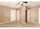 Serene bedroom with generous closet space, a ceiling fan, and ample natural light at 3802 N 50Th Ave, Phoenix, AZ 85031
