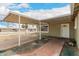 A single-story home with a front entryway and carport at 3802 N 50Th Ave, Phoenix, AZ 85031