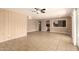 Comfortable living room with great natural light that flows into an open-concept kitchen at 3802 N 50Th Ave, Phoenix, AZ 85031