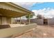 Large, covered patio area with concrete flooring, and access to a low maintenance backyard at 3802 N 50Th Ave, Phoenix, AZ 85031