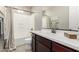 Bathroom featuring a shower/tub combo, vanity, and neutral decor at 3910 E Turley St, Gilbert, AZ 85295