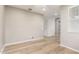 A well-lit empty room with hardwood floors at 3910 E Turley St, Gilbert, AZ 85295