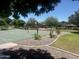 Community park featuring a basketball court, playground, and landscaped areas for Gathering fun and recreation at 3910 E Turley St, Gilbert, AZ 85295