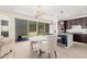 Bright dining area adjacent to the kitchen, featuring a stylish chandelier at 3910 E Turley St, Gilbert, AZ 85295