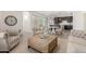 Open-concept living area with stylish furnishings and access to the backyard patio at 3910 E Turley St, Gilbert, AZ 85295