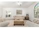 Elegant living room showcasing stylish sofas, decorative mirrors, and natural textures at 3910 E Turley St, Gilbert, AZ 85295