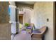 Cozy covered porch with wicker chairs, offering a relaxing outdoor space at 3910 E Turley St, Gilbert, AZ 85295
