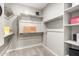 Organized walk-in closet with shelving and rods for ample storage at 3910 E Turley St, Gilbert, AZ 85295