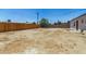 Large backyard is fully fenced, offering privacy and potential at 3933 W Nancy Ln, Phoenix, AZ 85041