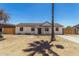 Charming single-story home featuring a well-maintained exterior and a spacious front yard at 3933 W Nancy Ln, Phoenix, AZ 85041