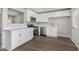 Modern kitchen with stainless steel appliances and white cabinets at 3933 W Nancy Ln, Phoenix, AZ 85041