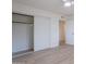Bright bedroom with closet and new flooring at 4031 W Palmaire Dr, Phoenix, AZ 85051