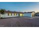 Charming single-story home with a two-car garage, desert landscaping and blue skies at 4031 W Palmaire Dr, Phoenix, AZ 85051