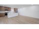 Modern kitchen featuring an island, stainless appliances, and open concept to a spacious room at 4031 W Palmaire Dr, Phoenix, AZ 85051