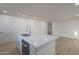 Kitchen island offers a stainless steel dishwasher and a large countertop at 4031 W Palmaire Dr, Phoenix, AZ 85051
