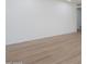 Bright living room featuring new flooring and fresh paint at 4031 W Palmaire Dr, Phoenix, AZ 85051