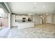 Spacious kitchen with stainless appliances, granite countertops, island, and seamless indoor-outdoor flow at 4242 E Erie St, Gilbert, AZ 85295