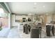 Open living space features an easy indoor outdoor flow with views to the dining area and kitchen at 4242 E Erie St, Gilbert, AZ 85295
