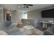 Neutral living space with modern furniture, plush seating, and a stylish rug for a comfortable relaxing atmosphere at 4242 E Erie St, Gilbert, AZ 85295