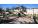 Community playground featuring modern equipment, shade canopies, and seating at 4242 E Erie St, Gilbert, AZ 85295