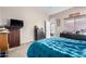 Comfortable bedroom featuring a large window and neutral tones, great for relaxation at 42758 W Camino De Janos --, Maricopa, AZ 85138