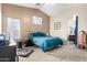 Comfortable bedroom featuring a large window and neutral tones, great for relaxation at 42758 W Camino De Janos --, Maricopa, AZ 85138