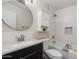 This newly renovated bathroom has a new vanity, fixtures, and a tiled shower/tub at 4325 W Sierra St, Glendale, AZ 85304