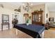 Spacious dining room boasts a view of an antique hutch and transitions smoothly into other living areas, ideal for hosting at 4401 E Barwick Dr, Cave Creek, AZ 85331
