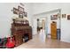 Hallway featuring tile flooring, neutral colors, and classic decor at 4401 E Barwick Dr, Cave Creek, AZ 85331