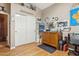 Charming office or craft room with hardwood floors, storage, and a cozy atmosphere at 4401 E Barwick Dr, Cave Creek, AZ 85331
