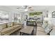 Bright living room with hardwood floors and access to the pool at 4554 E Coyote Wash Dr, Cave Creek, AZ 85331
