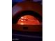 Illuminated pizza oven with glowing embers, ready to bake delicious pizzas at 4554 E Coyote Wash Dr, Cave Creek, AZ 85331