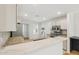 Kitchen with granite countertops, stainless steel appliances, and modern tile backsplash at 4808 E Betty Elyse Ln, Scottsdale, AZ 85254