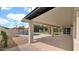 Inviting covered patio overlooking a private backyard oasis with pool views and lush landscaping at 5109 E Blanche Dr, Scottsdale, AZ 85254