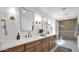 Elegant bathroom with double vanities, modern fixtures, spacious shower, and ample counter space at 5109 E Blanche Dr, Scottsdale, AZ 85254