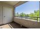 Open-air balcony provides a relaxing outdoor space with neighborhood views and a secure railing at 5345 E Van Buren St # 305, Phoenix, AZ 85008