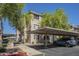 Condo building featuring covered parking at 5345 E Van Buren St # 305, Phoenix, AZ 85008
