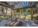 Community grilling area with built-in tables and BBQ grills, perfect for outdoor entertaining at 5345 E Van Buren St # 305, Phoenix, AZ 85008