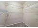 Empty walk-in closet with multiple wire shelves at 5345 E Van Buren St # 305, Phoenix, AZ 85008