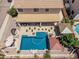 Aerial view of backyard featuring pool, patio, gazebo, and lounge area at 551 E Sun Valley Farms Ln, San Tan Valley, AZ 85140