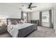 Bedroom featuring modern decor, neutral colors, and ample natural light at 551 E Sun Valley Farms Ln, San Tan Valley, AZ 85140