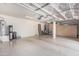 Spacious three car garage with built-in cabinets for extra storage at 551 E Sun Valley Farms Ln, San Tan Valley, AZ 85140