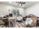 Bright office featuring modern furnishings including a wood desk and wicker chairs at 551 E Sun Valley Farms Ln, San Tan Valley, AZ 85140