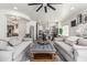 Open-concept living space with views into kitchen and backyard at 551 E Sun Valley Farms Ln, San Tan Valley, AZ 85140